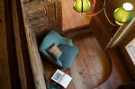 Zona relax della camera tripla dell'affittacamere A Barma Drola, a Brusson in Val d'Ayas